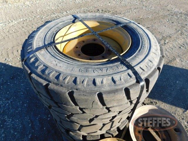 (3) 12R16.5 skid steer tires on 8-bolt rims,_1.jpg